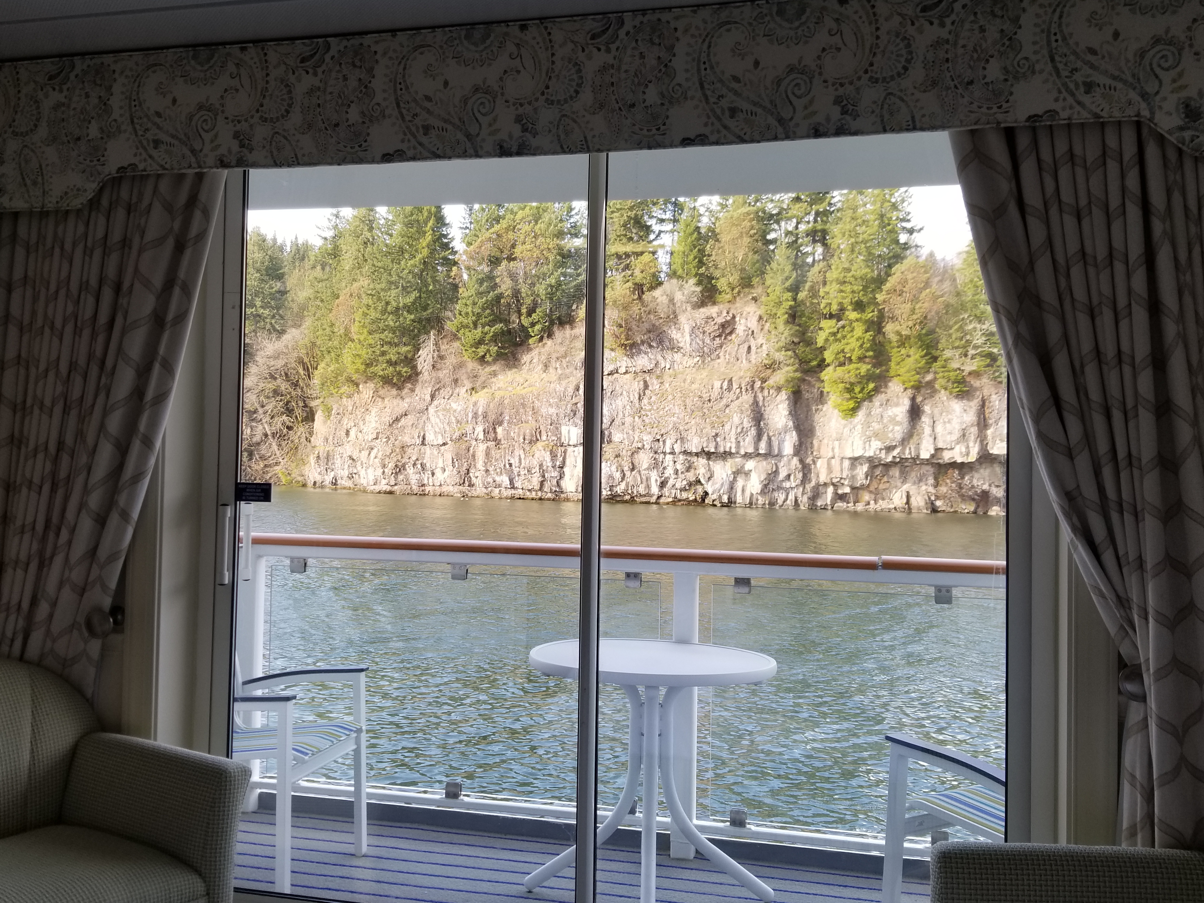A room with a view from the stateroom with its own private balcony. You can choose how much you want to socialize. Enjoy breakfast on your balcony if you desire! Aboard the American Song small cruise ship on the Columbia River.