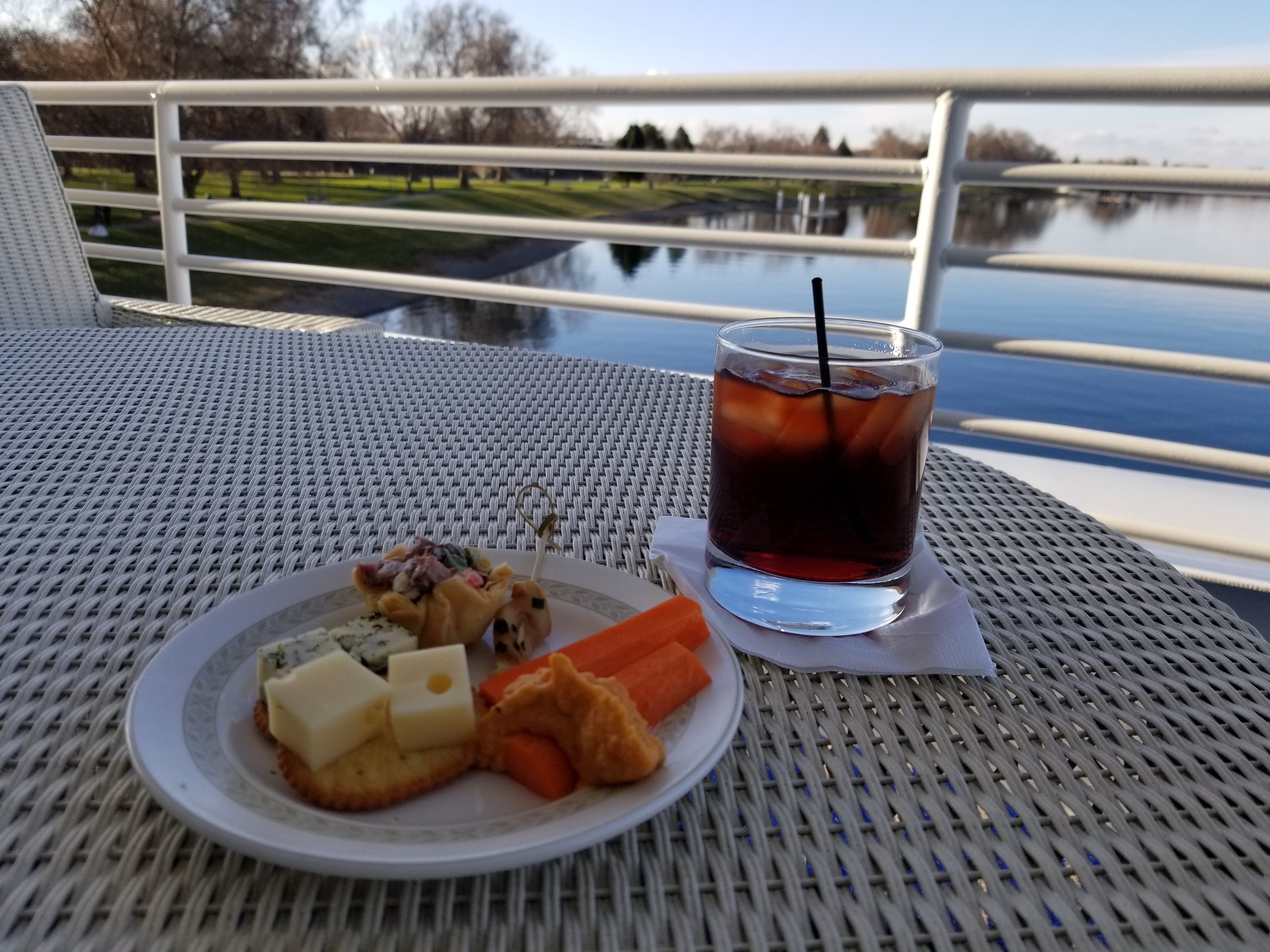 Cruising the Columbia River aboard the American Song with an afternoon cocktail and snack watching the world drift slowly by.