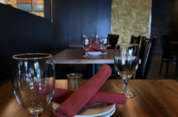 Nostra Tavola Italian restaurant in Vancouver Washington - interior table and wine glasses