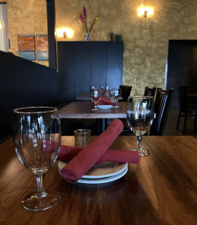 Nostra Tavola Italian restaurant in Vancouver Washington - interior table and wine glasses 